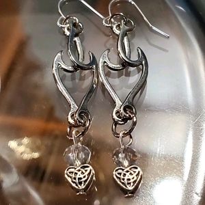 Long bangle silver earrings with Celtics heart